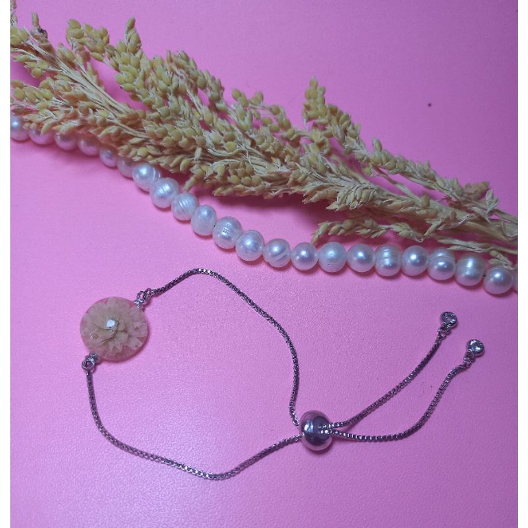 Gelang resin dengan bunga kering asliGelang Rantai Bahan Kuningan Dengan Cubic Zirconia Ukuran 1mm
P