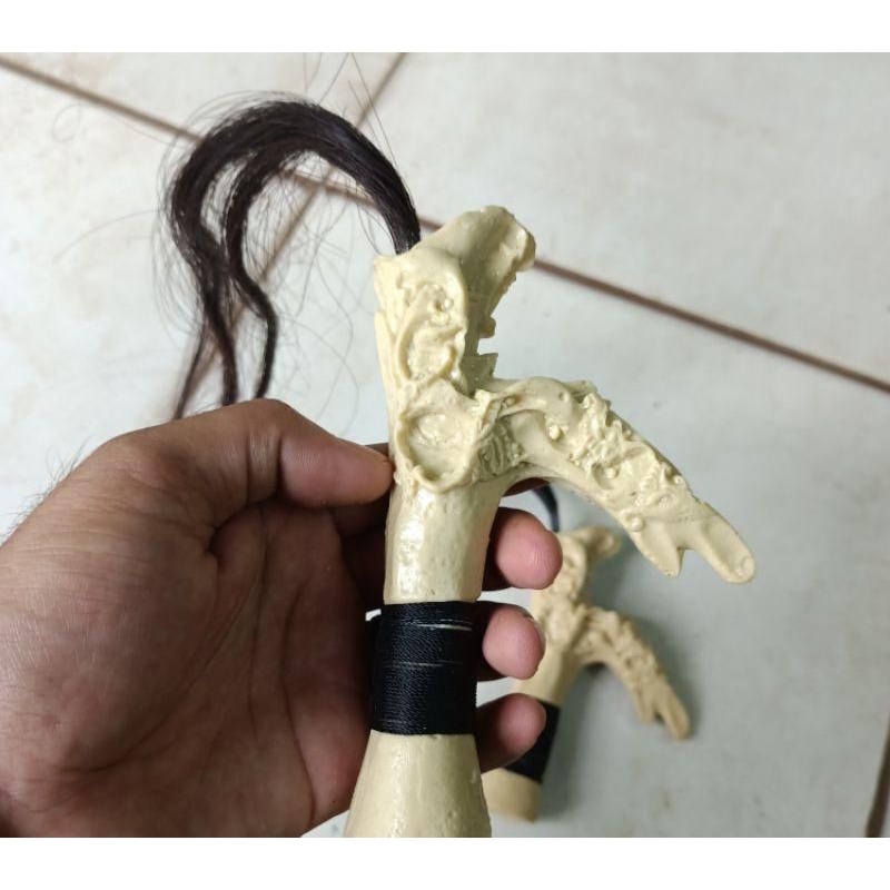 Gagang Mandau. Hulu Mandau.motif  Tanduk