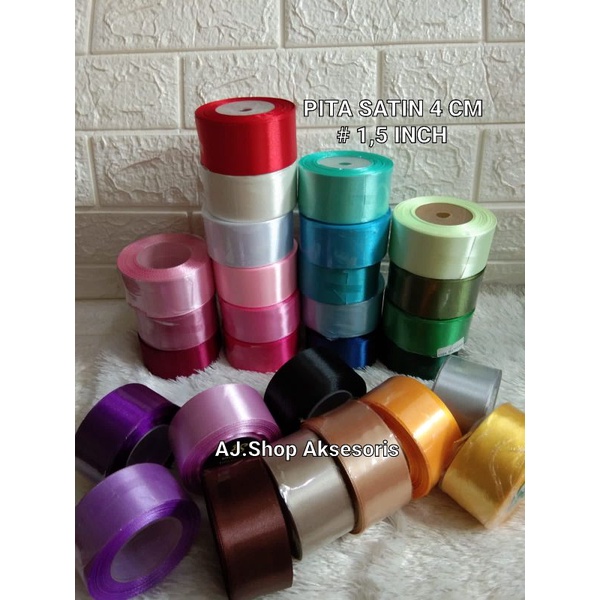 

PITA SATIN LEBAR 4 CM (1,1/2 INCH) HARGA PER ROLL