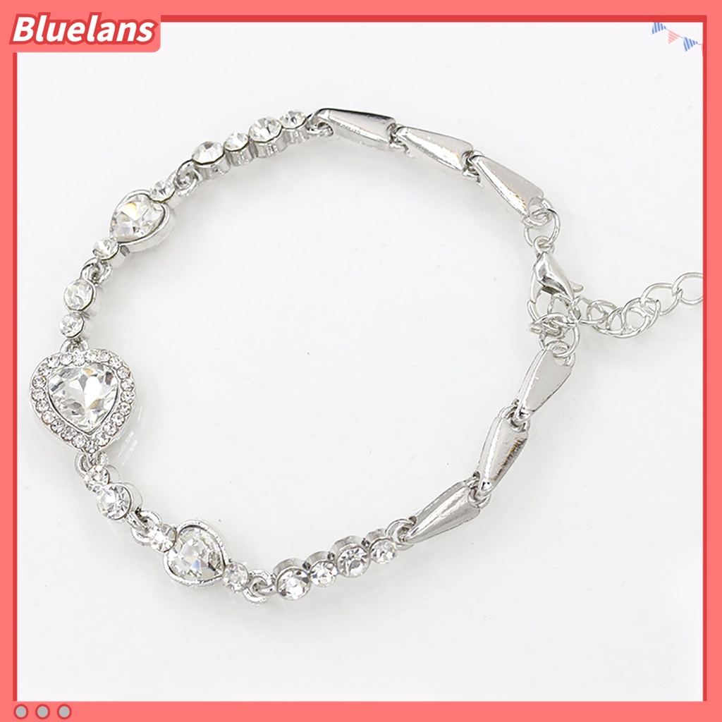 Gelang Rantai Adjustable Bentuk Hati Aksen Berlian Imitasi Warna Biru Bahan Alloy Untuk Wanita