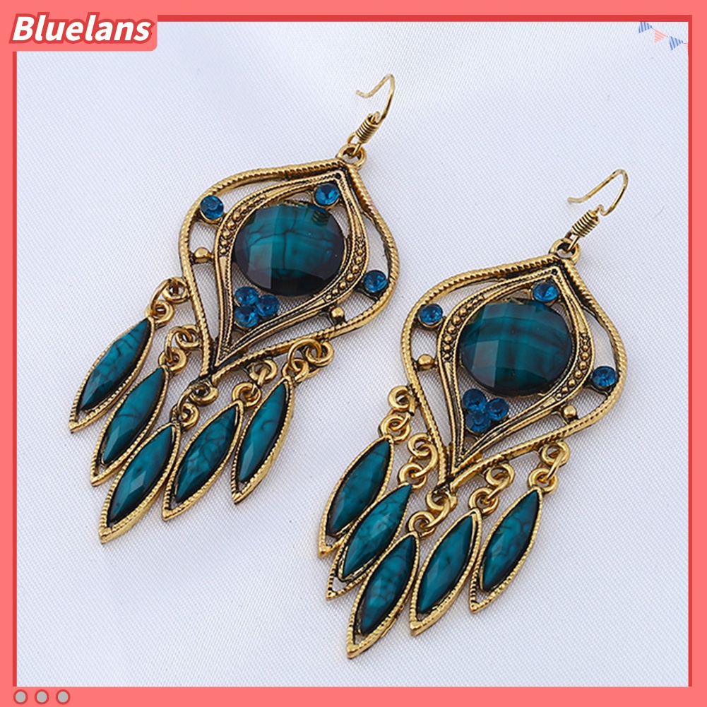 Anting Kait Gantung Panjang Desain Ukiran Hollow Bahan Resin Gaya Bohemian Untuk Wanita