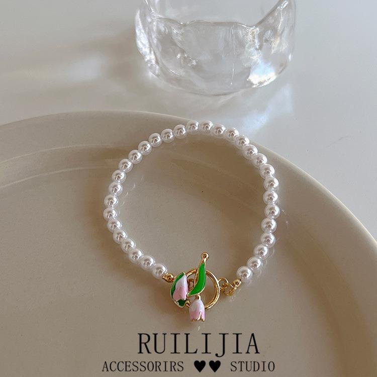 Gelang Tangan Rantai Aksen Bunga Tulipmutiara Imitasi Gaya Vintage Untuk Wanita