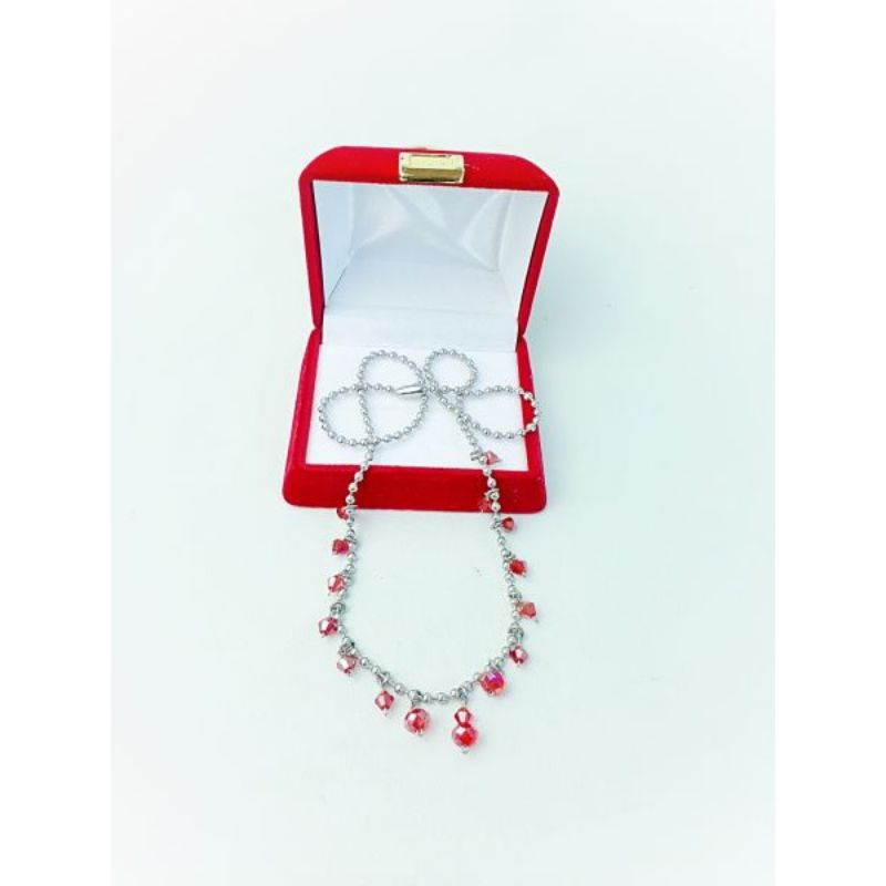 Kalung crystal merah baja putih