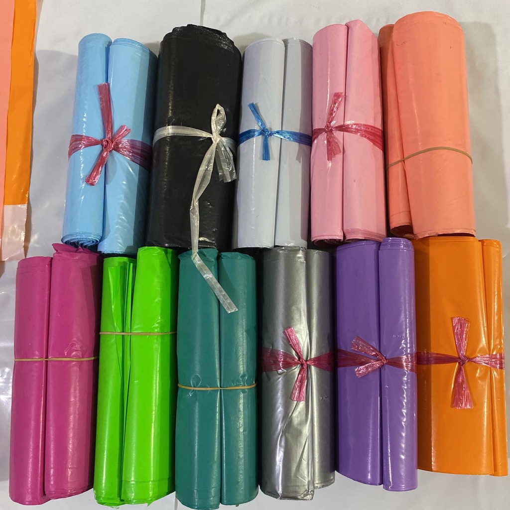 

ISI 100 LEMBAR Plastik Polymare olshop ukuran KECIL sudah ada lem nya tebal Bahan Kualitas mantap