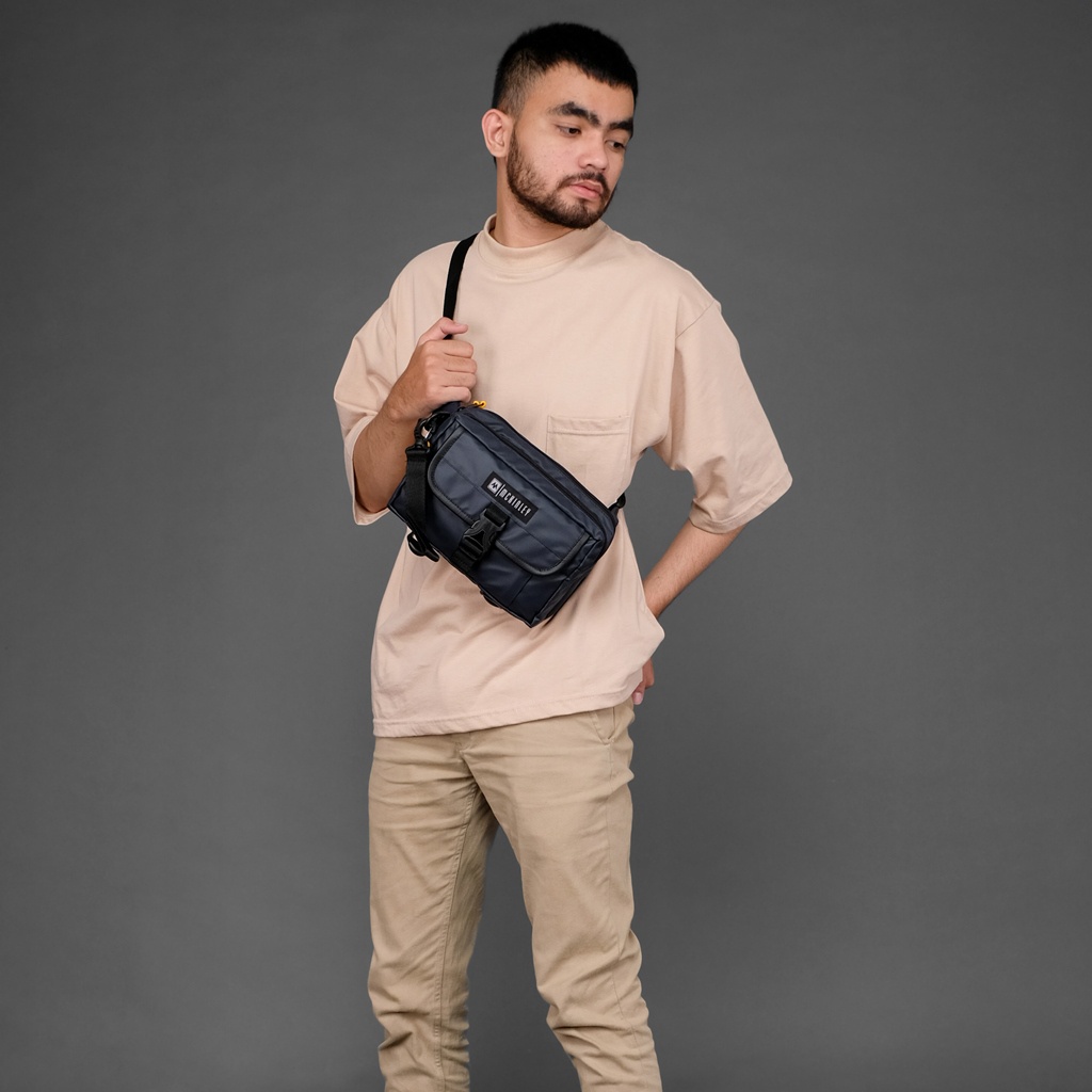 MORIA NAVY ORIGINAL x MCKINLEY Tas Selempang Hitam Biru Dongker Slingbag Casual Multifungsi Jalan Santai Main Hangout Nongkrong Sling Bag Distro Remaja Dewasa Daily Shoulder Bag Premium Shoulderbag Simple Pouch Clutch Bag Tas Slempang Bahu Dada Kekinian