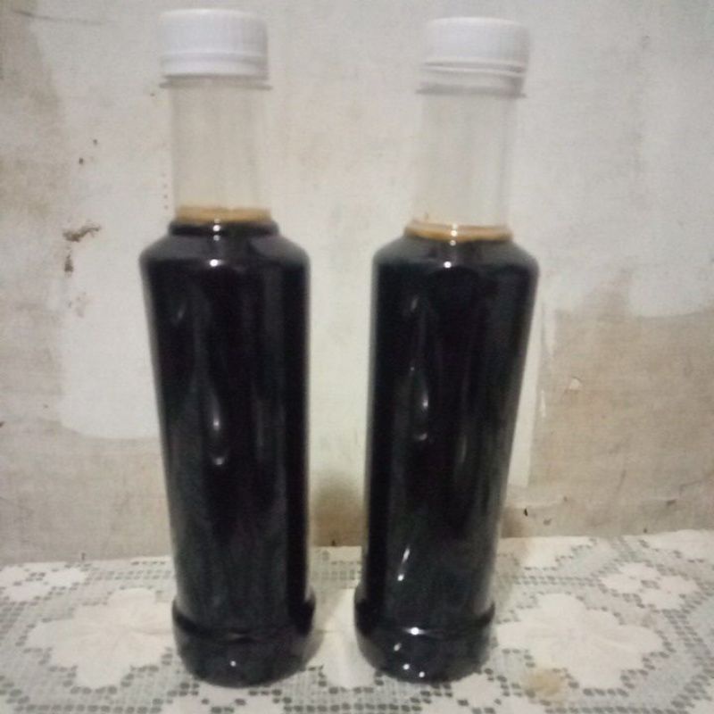 

madu hitam hutan asli