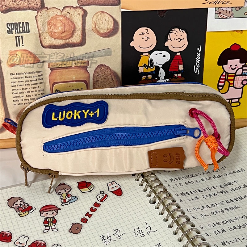 

✹▪♣Sera warna kontras mahasiswa perempuan multi-fungsional niche kapasitas besar tiga lapis tas penyimpanan alat tulis retro bernilai tinggi tas pensil