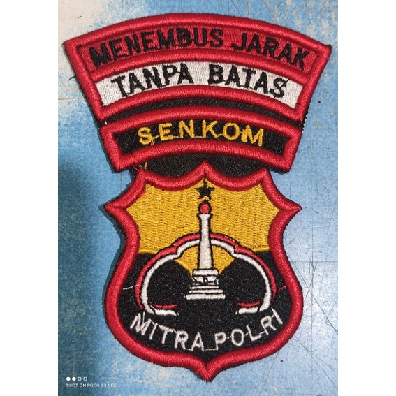 Logo Menembus jarak Tanpa Batas Bordir timbul