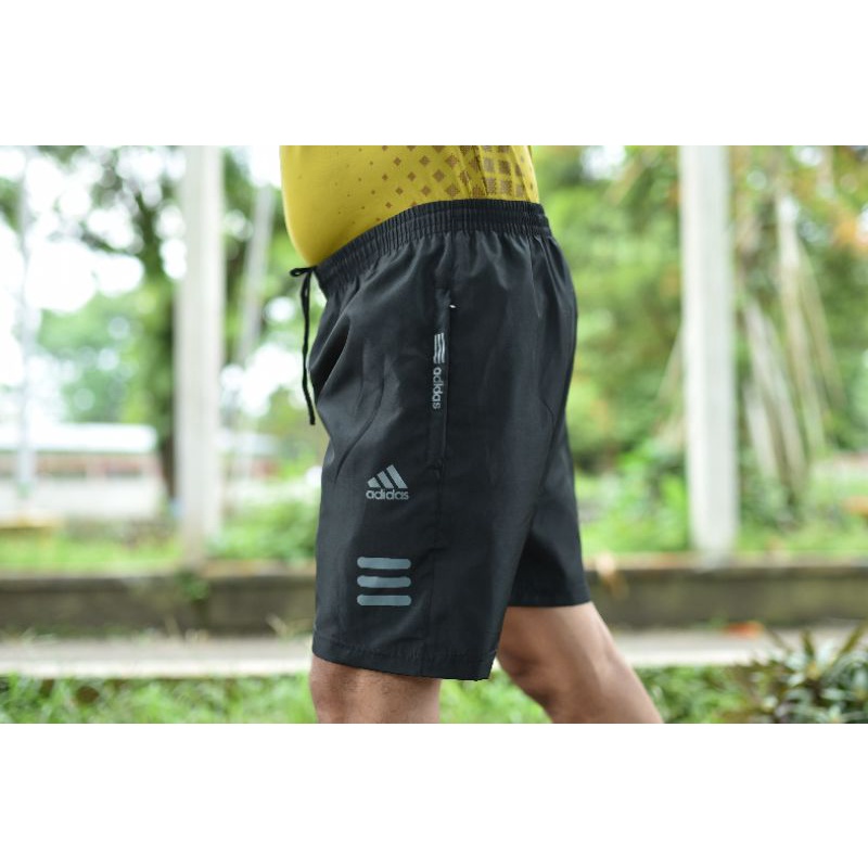 celana pendek running gym parasut