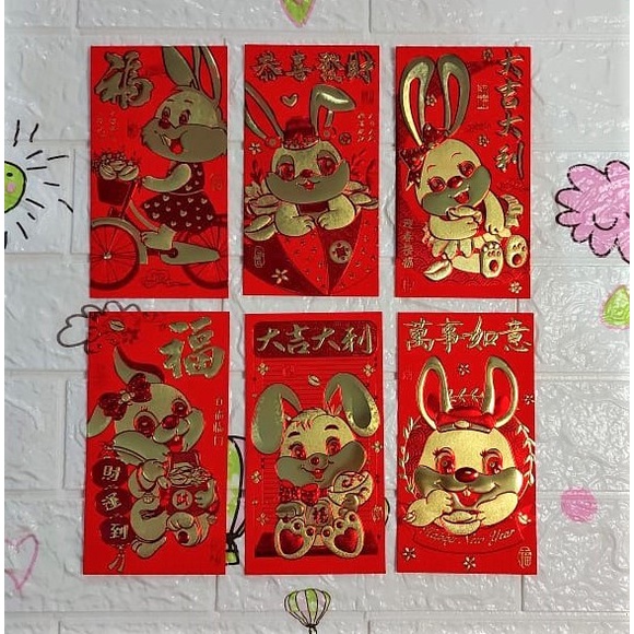 

Angpao Imlek Shio kelinci Terbaru Premium Besar YS2014 Kertas Dove Emboss Emas Kilap Import Isi 6 Campur Motif Sesuai Gambar