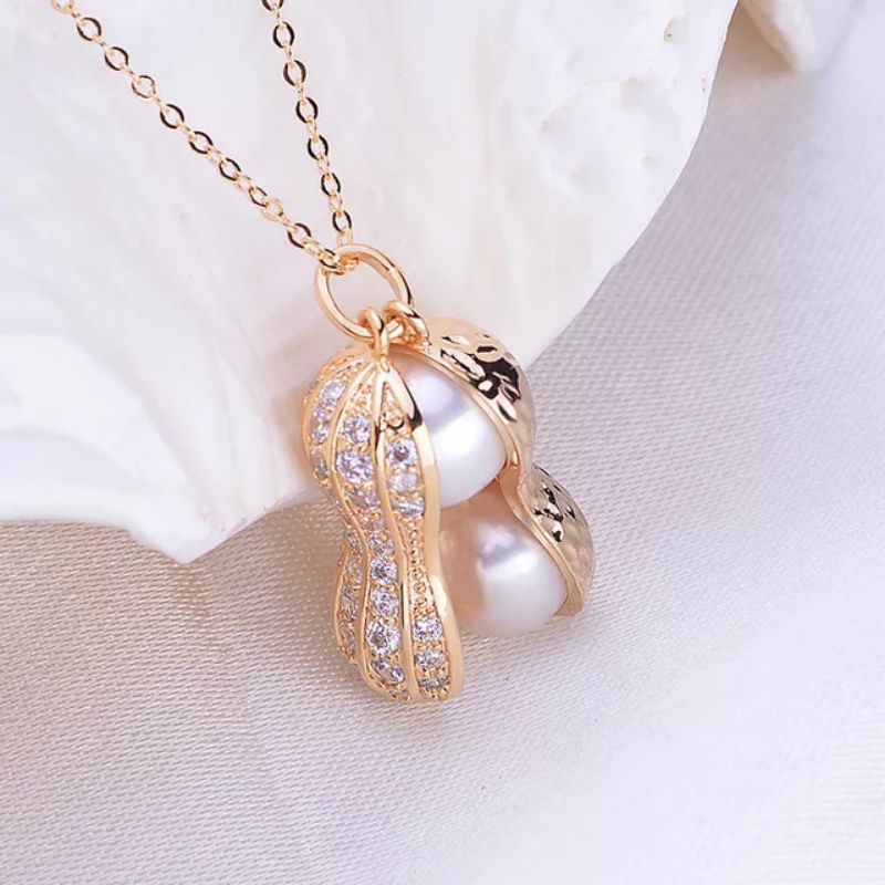 kalung titanium mutiara import