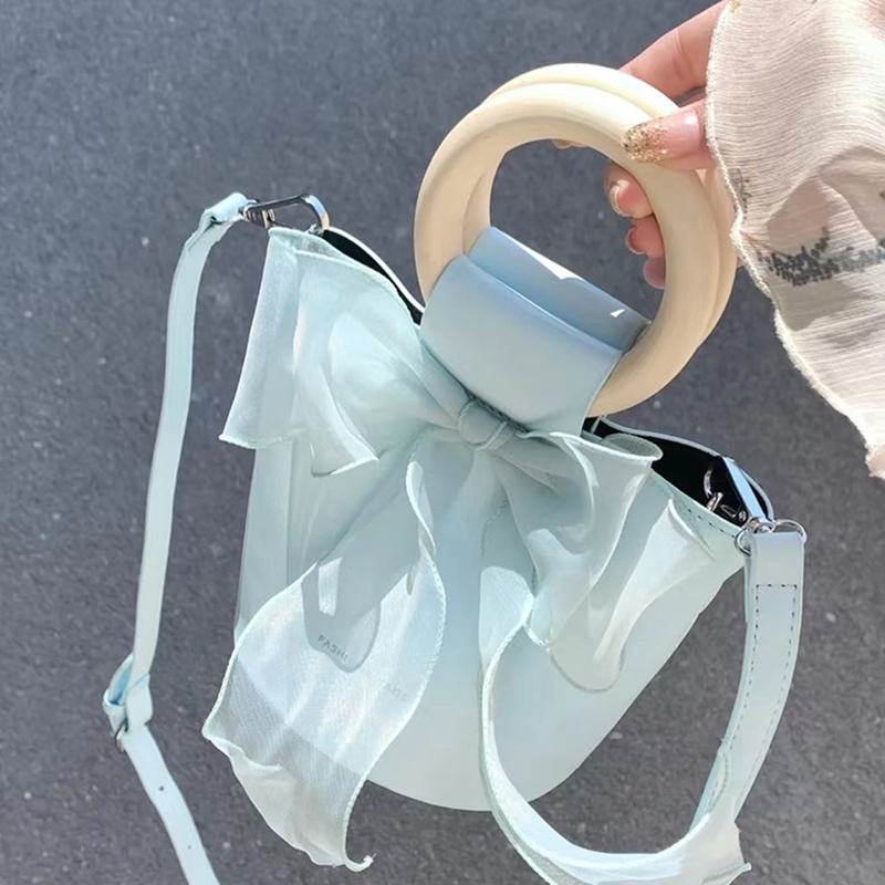 Suhao bow handbag wanita 2022 fashion trendi baru tas ember kecil segar cocok untuk semua tas messenger bahu tunggal