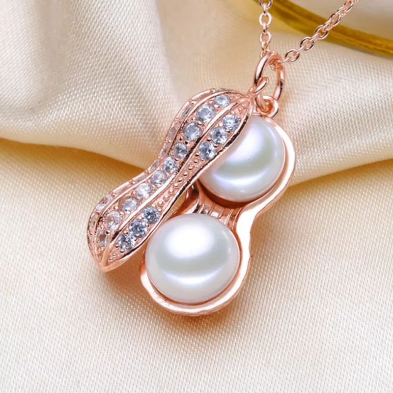 kalung titanium mutiara import