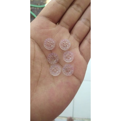 kancing merek sendiri campur bening dan putih