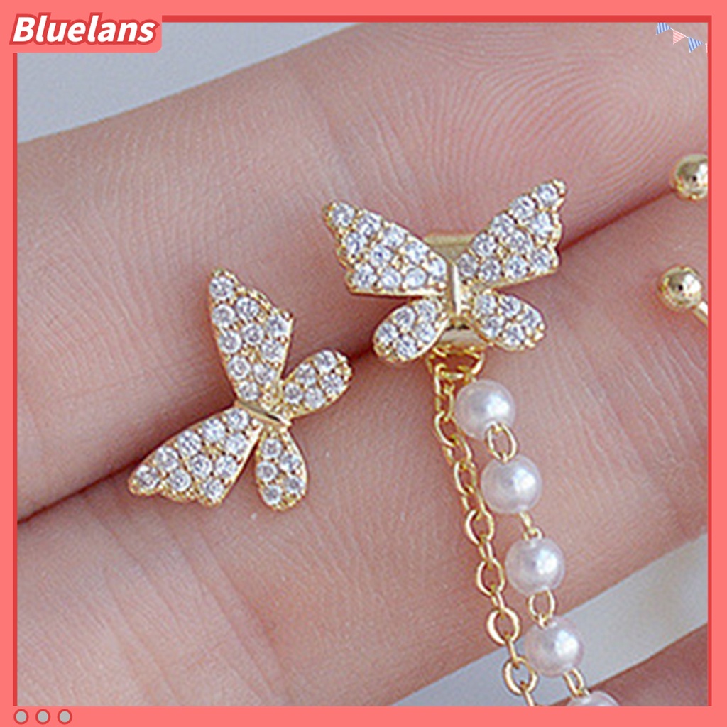 2pcs / Set Anting Stud Bentuk Kupu-Kupu Aksen Berlian Imitasi Untuk Wanita