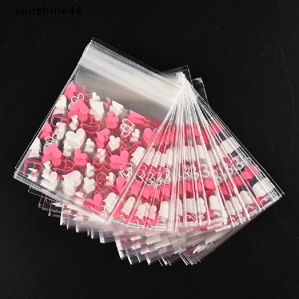 Sunshine 100pcs / Set Mainan Hati Manis Untuk Anak Kantong Plastik Kemasan Kue / Permen / Biskuit DIY Dengan Perekat Untuk Suvenir