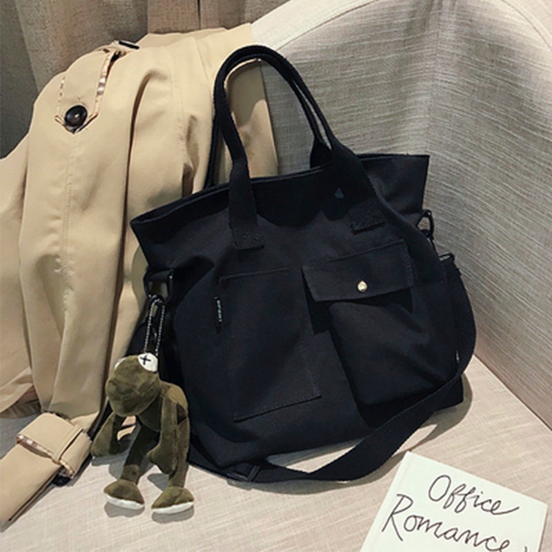 ₪❖∏Sera tas kanvas besar tas wanita baru 2022 versi Korea dari kelas siswa tas jinjing portabel tas bahu tas kurir pasang