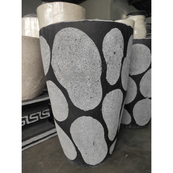 Pot semen kapsul corak batu