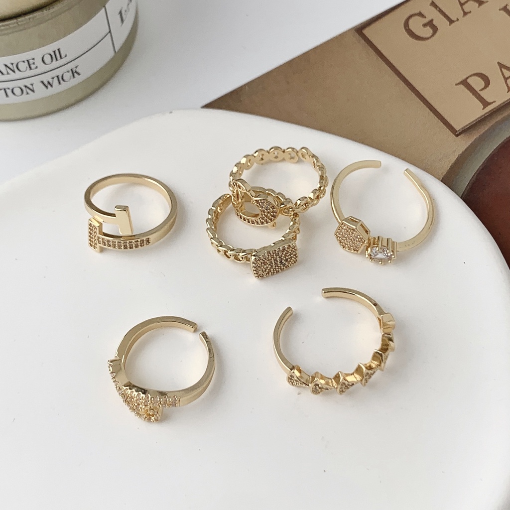 Cincin Model Terbuka Bahan Alloy Plating Gold Desain Hati Hias Berlian Imitasi Untuk Wanita