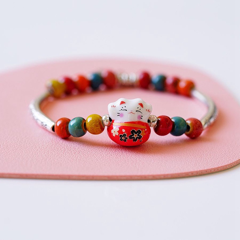 Gelang Tangan Manikmanik Keramik Stretch Aksen Kucing Plutus Warna Merah Untuk Wanita