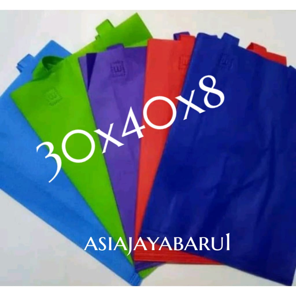 

Goodie Bag handle lipat samping uk. 30x40x8 Tas spondbond promosi 70gsm