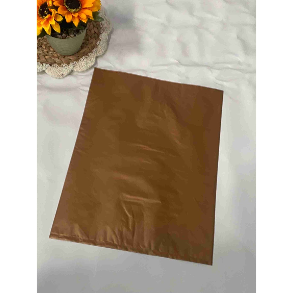 Plastik Packing Olshop Plong HD Tanpa Lubang Ukuran 25x35