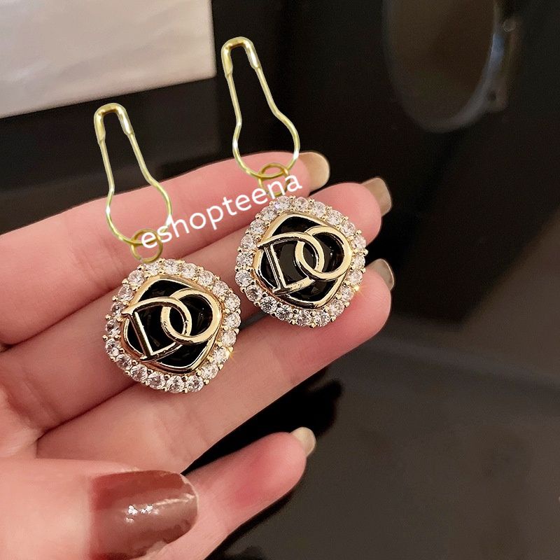 A122 anting hijab segi 4 hitam gold mata_anting jilbab