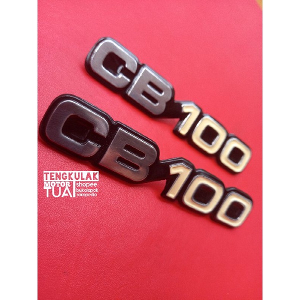 emblem tepong box bok aki side cover imitasi mirip ori original cb100 cb 100 k2 cream