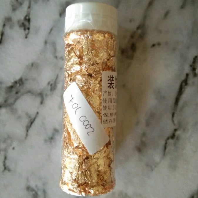 

Edible gold foil 2 gr edibel daun emas Hiasan Tart/Taburan Cup Cake/Dekorasi kue bisa dimakan