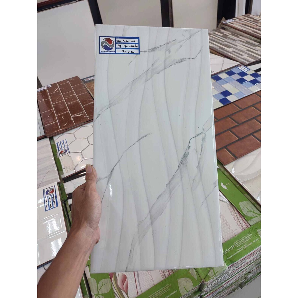 DINDING 25X50 SIEN WHITE / UNO