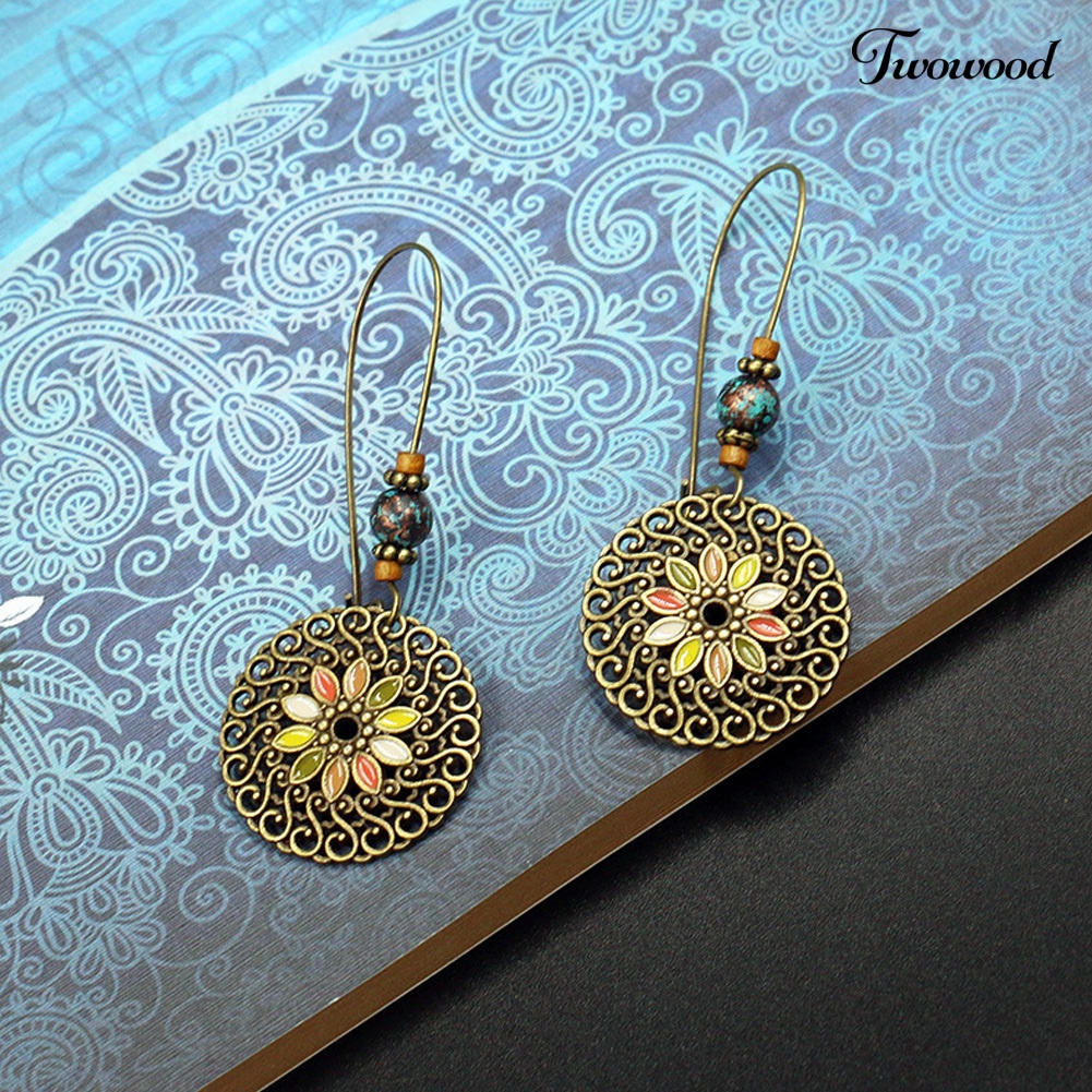 Anting Gantung Panjang Bentuk Bulat Motif Bunga Model Hollow Gaya Vintage