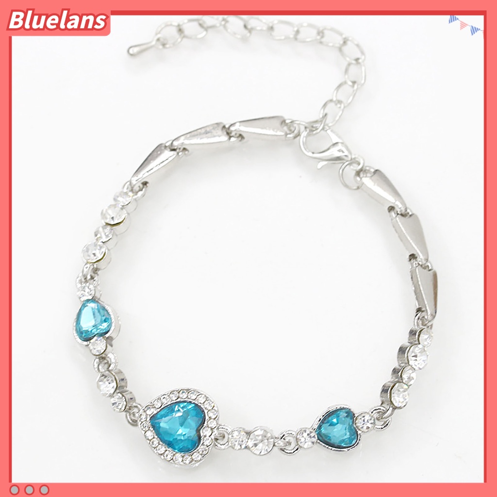 Gelang Rantai Adjustable Bentuk Hati Aksen Berlian Imitasi Warna Biru Bahan Alloy Untuk Wanita
