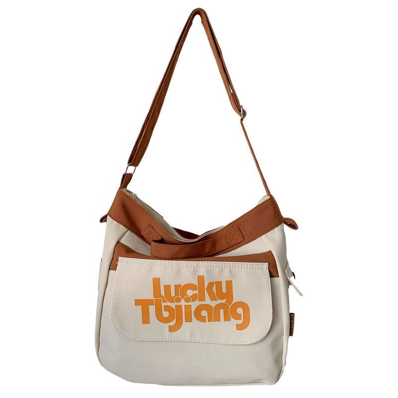 Sera๑▲Tas komuter berkapasitas besar tas messenger kelas siswa Jepang dengan warna hit all-match niche canvas bag