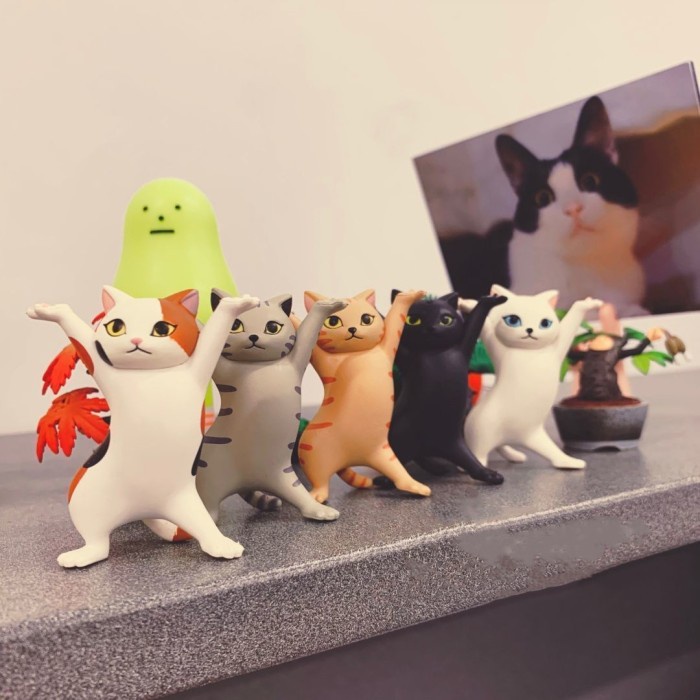 

Stationery Dancing Cat Holder / Cat Stand Holder Imut Multifungsi