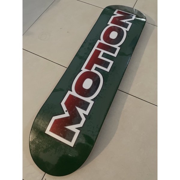 motion skateboard deck New G red