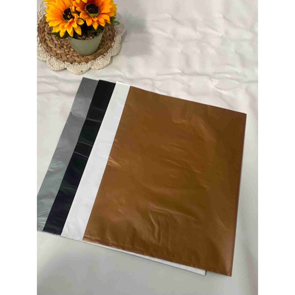 Plastik packing olshop plong HD tanpa lubang ukuran 35x50