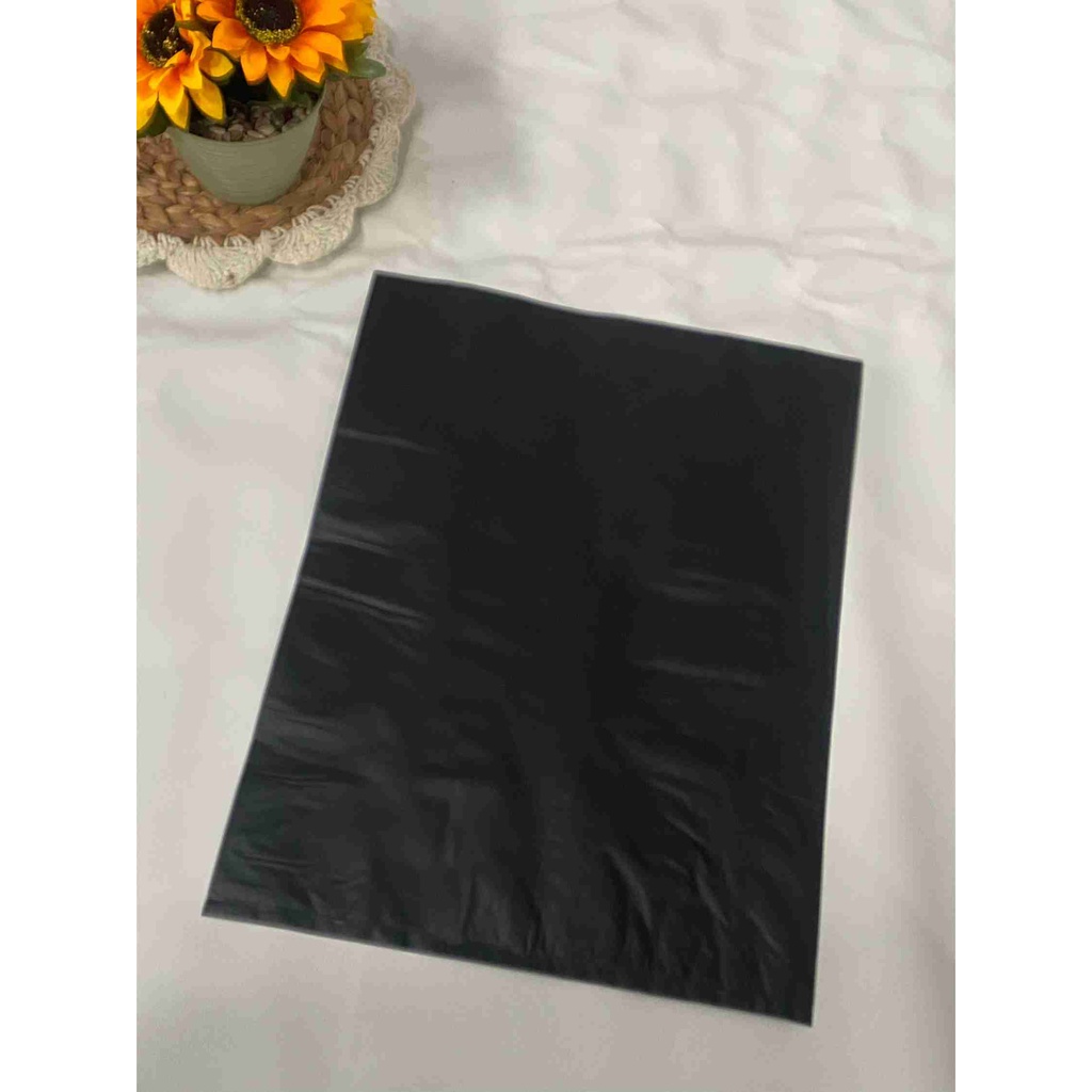 Plastik packing olshop plong HD tanpa lubang ukuran 30x40