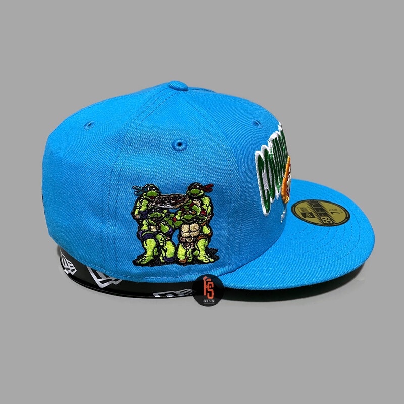 TOPI NEW ERA ORIGINAL 5950 PIZZA TMNT SKYBLUE UV GREEN