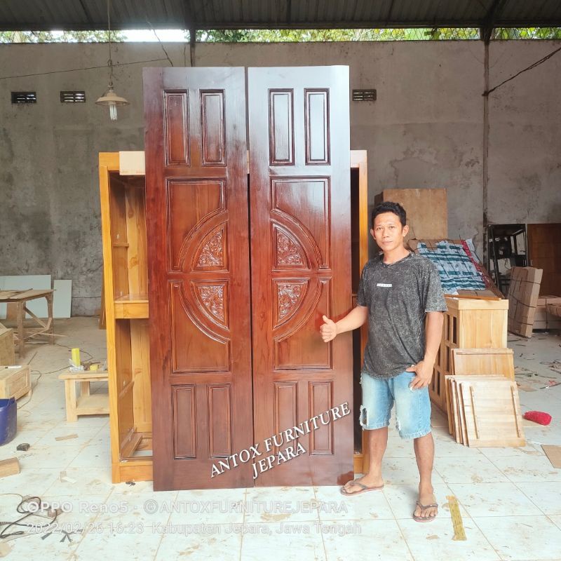 pintu utama rumah kayu jati pintu kupu tarung ukiran mebel Jepara
