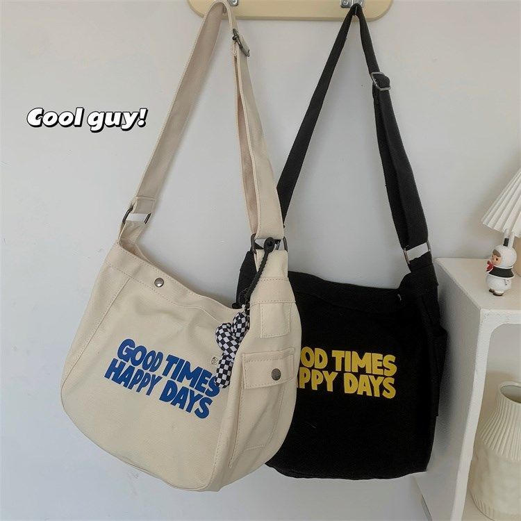 ✢✺✸Tas komuter Jepang in letter printing niche girl all-match canvas bag student class tas messenger berkapasitas besar