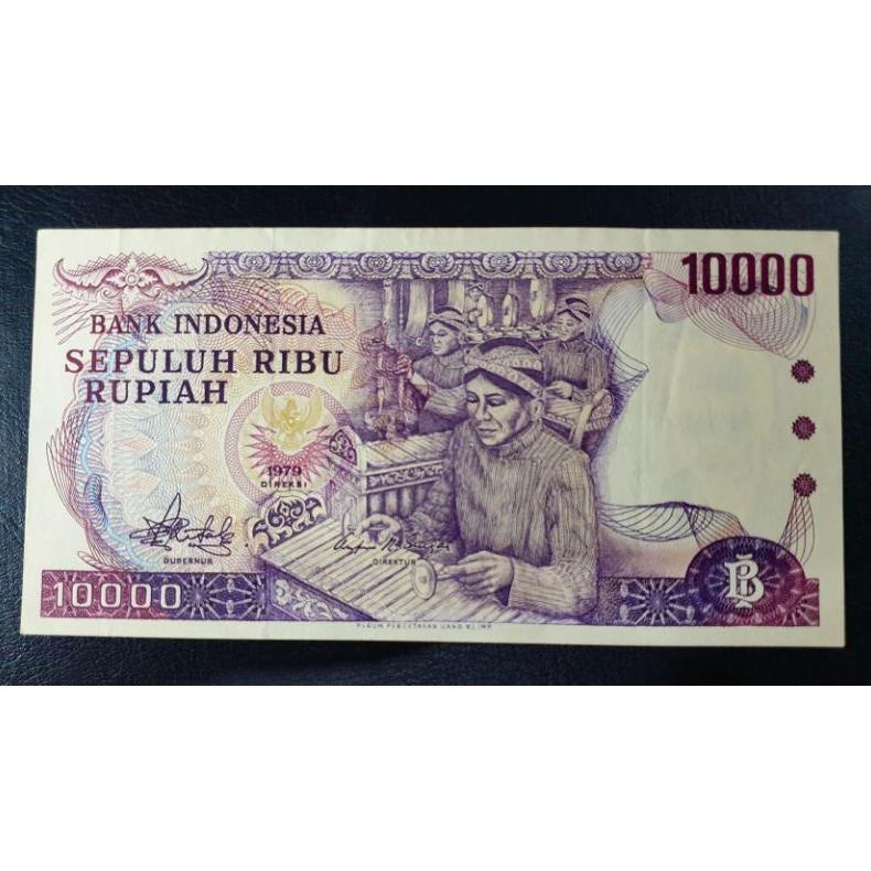 PRODUK- UANG KUNO 10000 RP TAHUN 1979 PENABUH GAMELAN SERI X .