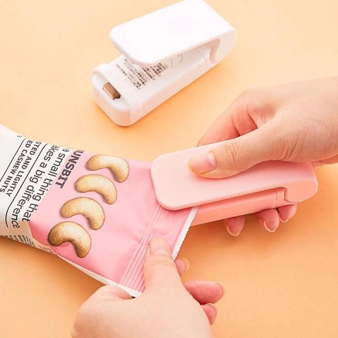 

.........] Alat Perekat Plastik Mini Hand Heat Sealer - Multi-Color