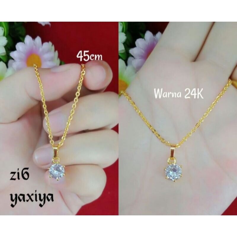 kalung titanium Nuri Liontin mata satu gold titanium anti karat