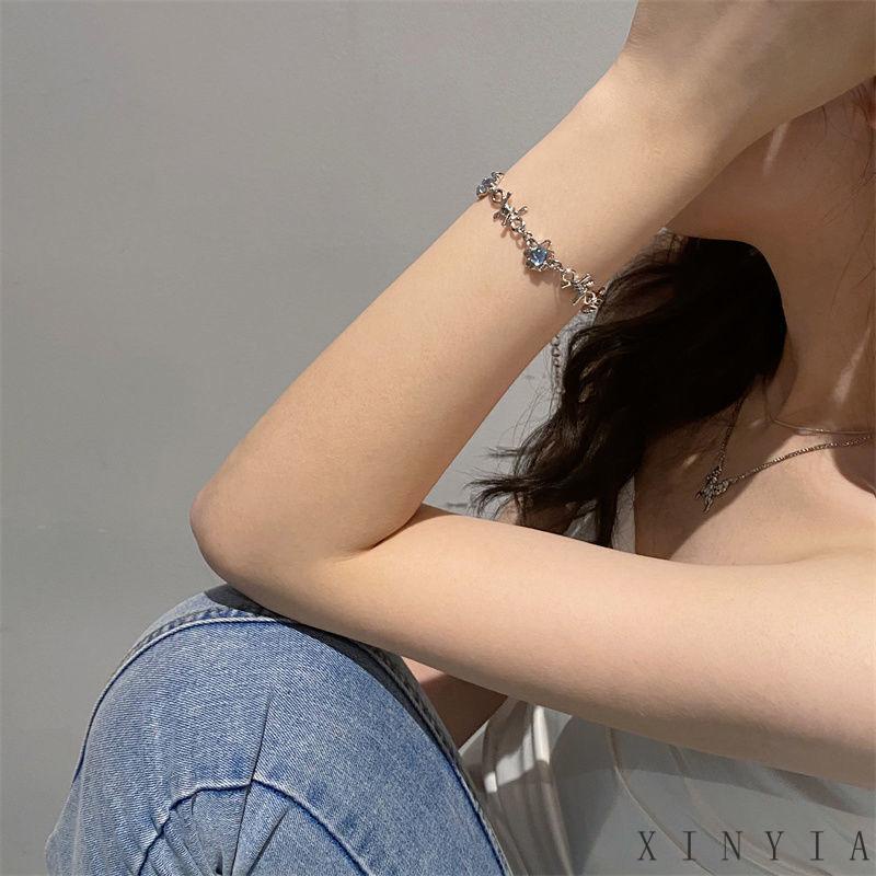 Xia.id Gelang Tangan Titanium Aksen Duri + Batu Bulan Gaya Hip hop Untuk Wanita