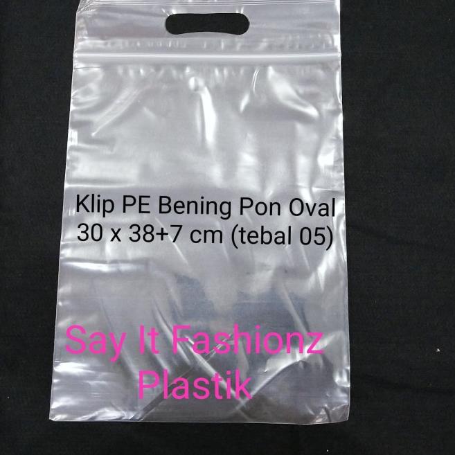 

Kantong Plastik Klip Pon Oval PE Bening 30x38+7cm tebal 05 isi 100lbr