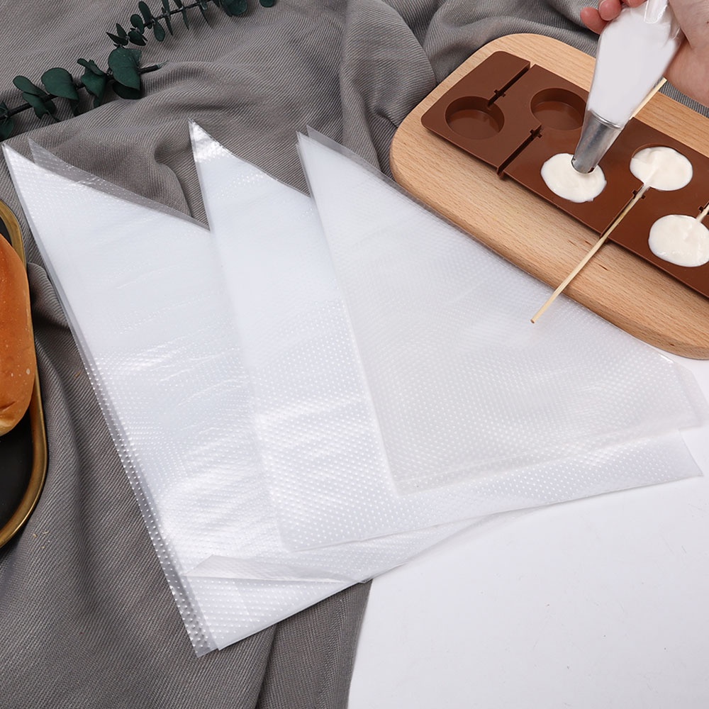 20pcs / Lot Kantong Pipa Icing Fondant Bahan Plastik Food Grade Sekali Pakai Untuk Dekorasi Kue