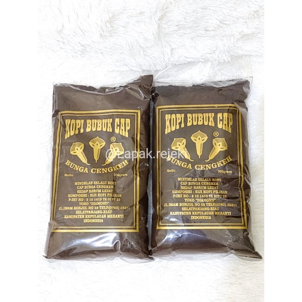 

Kopi Bubuk Halus / Kasar 500Gram Asli Kepulauan Meranti Selatpanjang / Kopi Bubuk Cap Bunga Cengkeh