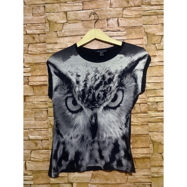 Muzca Woman black top