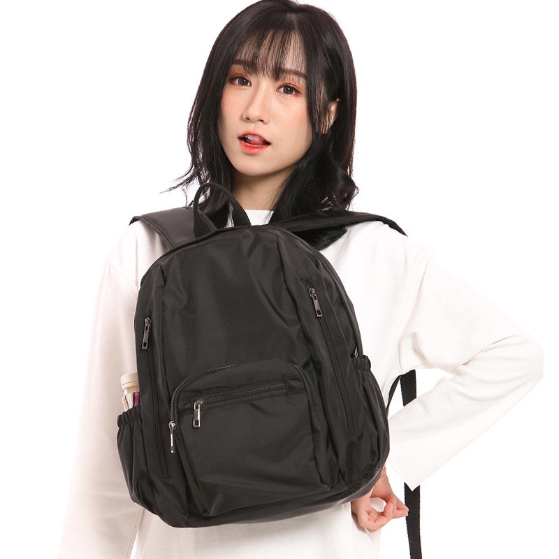 sera multi-saku ringan tahan air ransel kasual perjalanan trendi fashion keren tas sekolah ransel wanita unisex