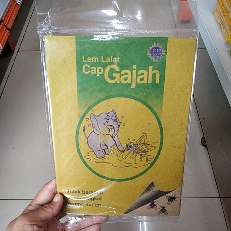 lem lalat kertas cap gajah